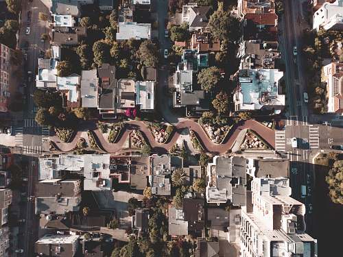 landscape aerial photography of buildings near road nature
